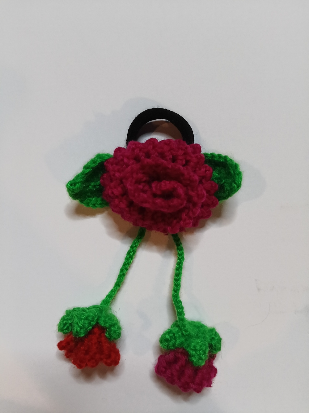 Handcrafted Crochet Flower Hair Tie in Magenta and Green - Picture 2 of 2